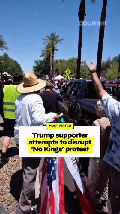 This Trump Supporter Stopped in the Middle of the Road and Grabbed a Flag While Shouting Racist Slurs and Being Extremely Aggressive! Everyone Came Together and Stopped Him and He Was Made to Leave, but Not Before Throwing Water at Protesters. He Was Arre