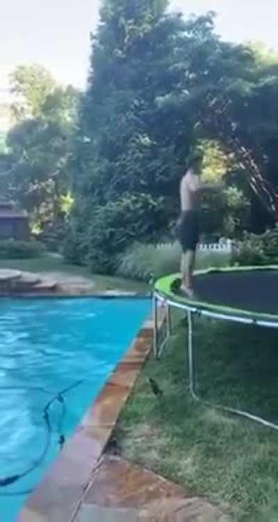 Flipping into a pool from a trampoline