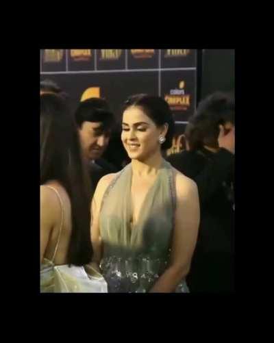 The woman in the bg is his wife