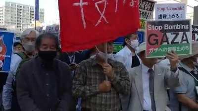 This is a global movement. Hundreds of Japanese protesters surround the Israeli embassy in Tokyo, demanding a ceasefire or the shut down of the embassy.