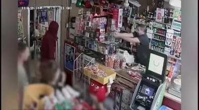 Idiot gets robbed by idiots then idiotically blind fires out the door.