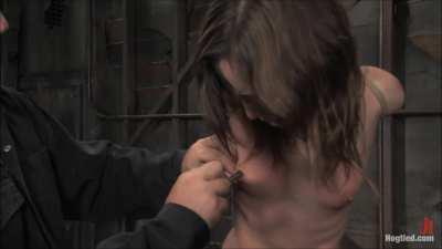 Amber Rayne suffers on the wooden horse