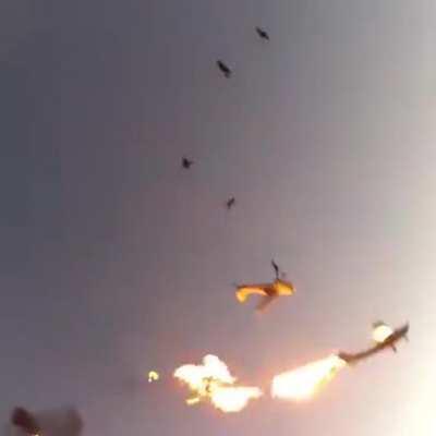 Skydivers and pilots all survive after their planes collide.