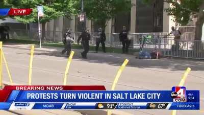 SLC PD cop shoves elderly man with walking stick , another helps him up