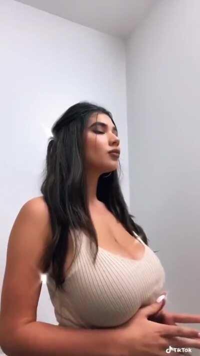 Anyone know who this gorgeous busty woman is?