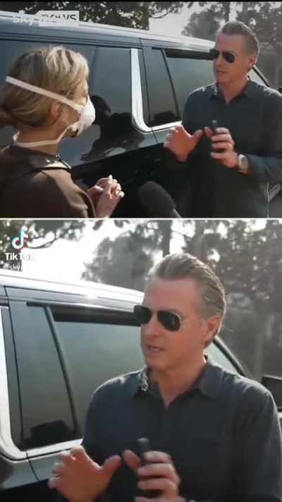 A Pacific Palisades resident confronts California governor for help