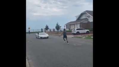 Dude tries to jump over a Lamborghini