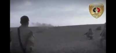 Iraqi Emergency response division soldiers blowing up ISIS fighters by bullets and grenades in Anbar desert.