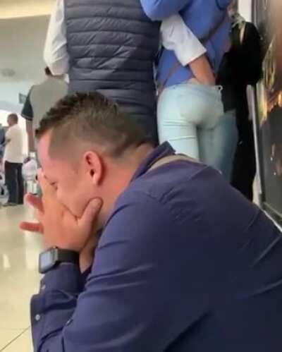 Poor guy can't control laughing at assfingering in public