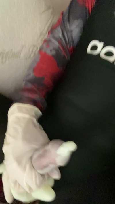 Filling a glove wearing a full bodysuit and leotard [nb]