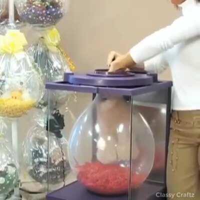 This balloon expander for filling the balling with items