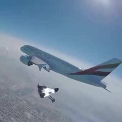 And the camera man flying next to him of course