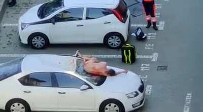 NSFW! This guy just jumped from balcony, naked! Got this from a friend.