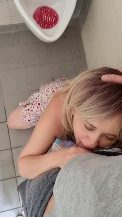 Fucking girlfriend's throat at the urinals