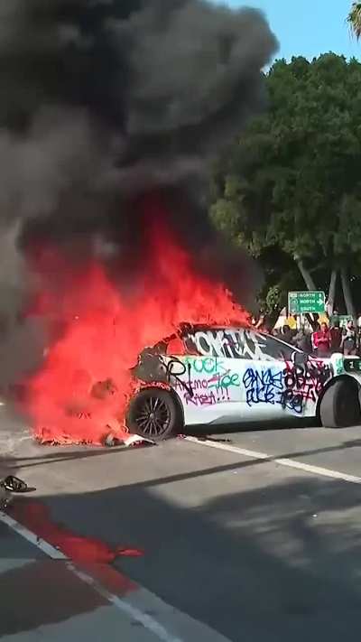 Protesters set Waymo cars on fire in Los Angeles