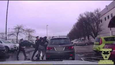 Football Player Body Slams Officer