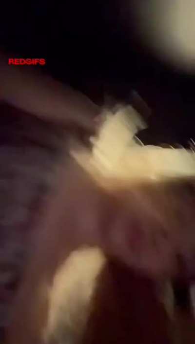 Chinese with big plug outside in Shanghai