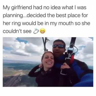 Holding a ring in your mouth while skydiving...