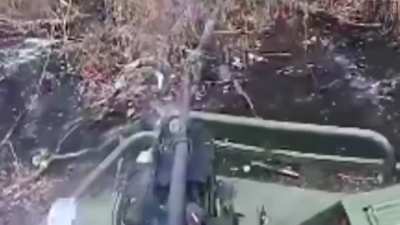 Ukrainian ground drone with a machine gun engages Russian infantry in combat