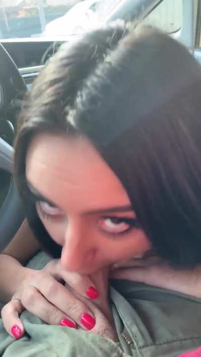 Blonde babe giving a wild blowjob in the backseat