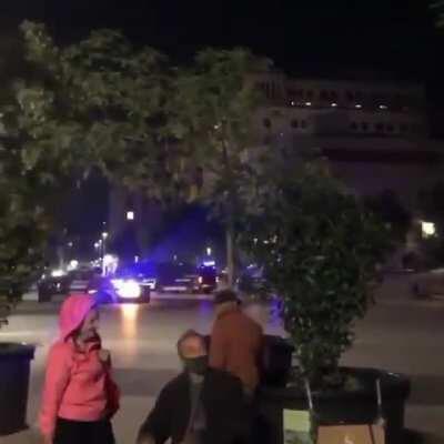 'Fiddle while rome burns?' This Man calmly plays a piano as Police & Demonstrators clash amid anti-lockdown demonstrations, Fires unfolding around him in Barcelona, Spain.