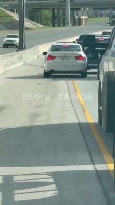 Psycho points gun at 55-year-old woman after she accidentally cut him off