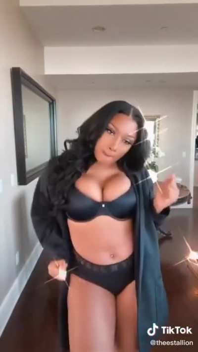 Megan dancing in her underwear and nearly bursting out of her bra