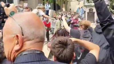 BLM protesters in Bristol, England, pull down a statue of a 17th century slave trader