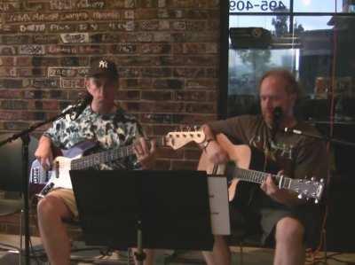 That chorus , 2 middle-aged guys playing in the corner of a pizzeria in Utah.