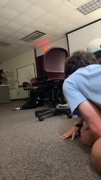 Footage from inside Florida state university classroom as someone bangs on the door claiming to be police