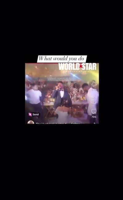 Dude bring wife favorite singer to serenade their wedding. Wife embarrasses him by being all over singer and getting on her knees for him