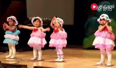 Little girl carrying the whole performance in tears while all the other kids forgot the dance