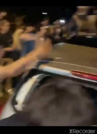 They seemingly flipped over a random car.