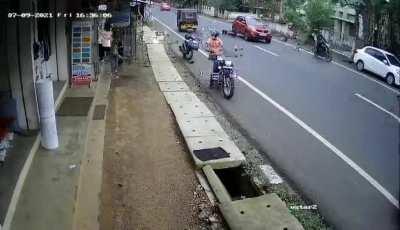 [India] Careless bike driver accident road.