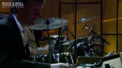 Prince suddenly appears, drops the greatest guitar solo of all time and then walks away like it's a Tuesday.