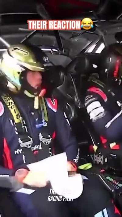 Race car drivers reaction to their crash.