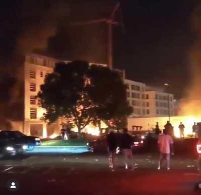 Target store in Minneapolis being looted, while massive fires burn outside
