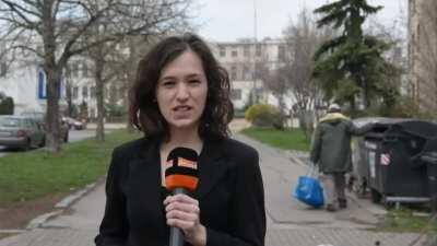 WCGW leaning on waste containter.
