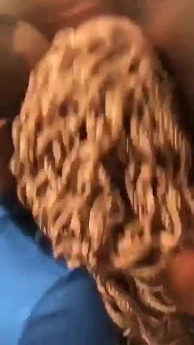 In the elevator in front of everyone