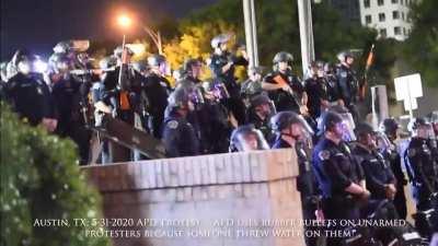 APD gets water splashed on them and immediately fires into the crowd.
