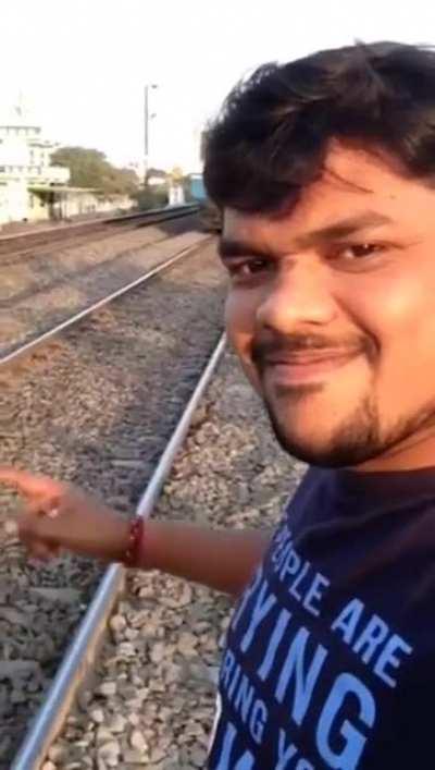 Guy Gets Hit By Train While Taking Selfie