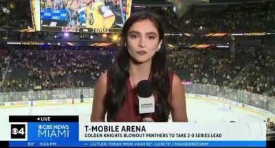 Samantha Rivera of CBS Miami stiff-arms obnoxious Vegas fan after the game