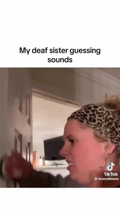 She is feeling external vibration and trying to match it with internal vibration