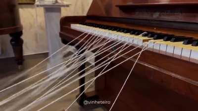 'Spider man' plays the Piano