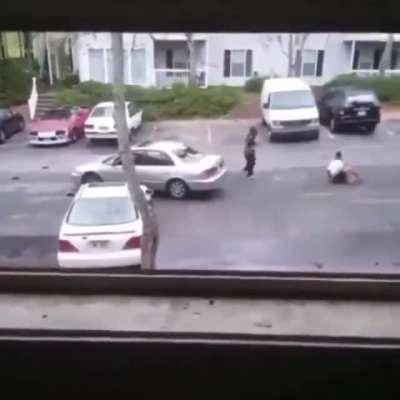 Woman throws things at car, gets her just deserts