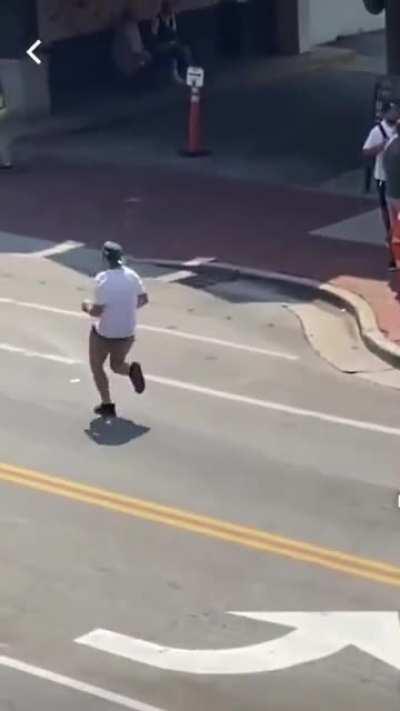 Man running away from the ambulance because he's afraid of the bill