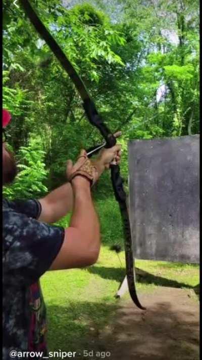 Man demonstrates his extreme archery skills