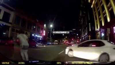 Woman catches an uber in the middle of a shootout