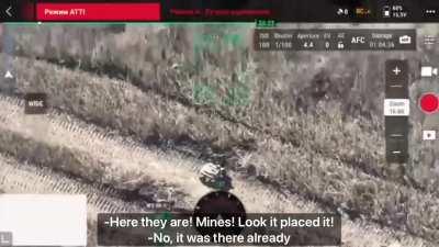 Russians watch Ukrainian WALL-E laying mines (subtitles)