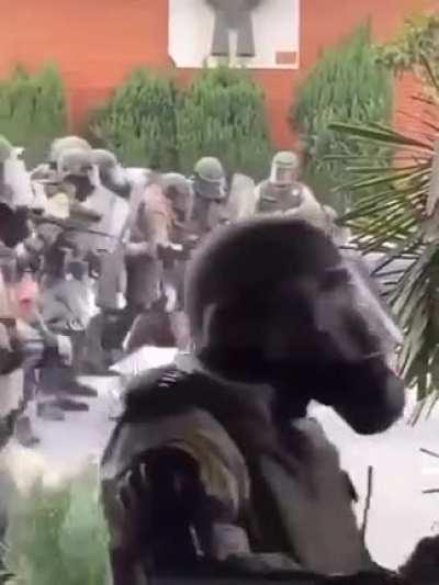 How the police handle peaceful protestors kneeling in solidarity